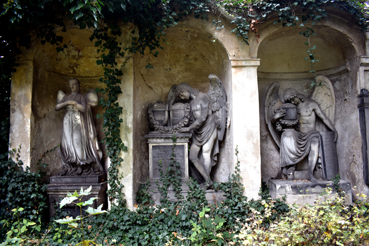 Prague Olsany Cemetery - niche graves, two with similar angels