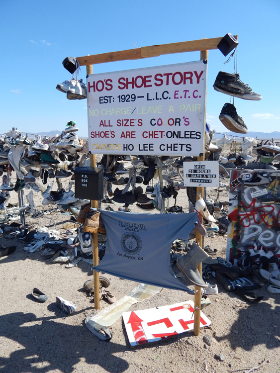 Ho's Shoe Story sign at Shoe Fence, California Route 62, Rice, California