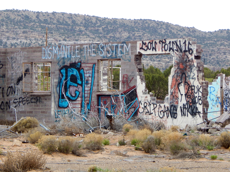 graffiti at abandoned Standard Oil station, Cow Springs, Arizona