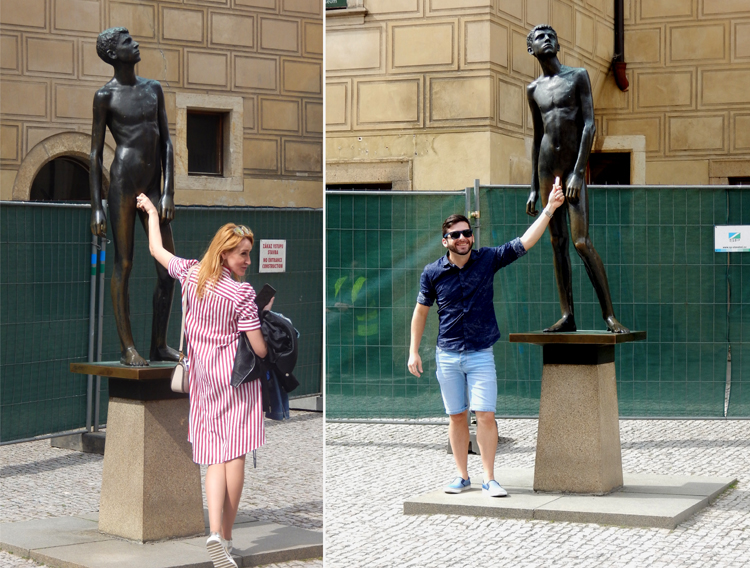 Praha - Mladi (Youth), statue at East Gate of Prague Castle, with tourists