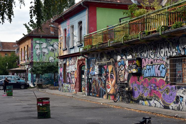 Ljubljana - graffiti covering buildings and walls in school courtyard