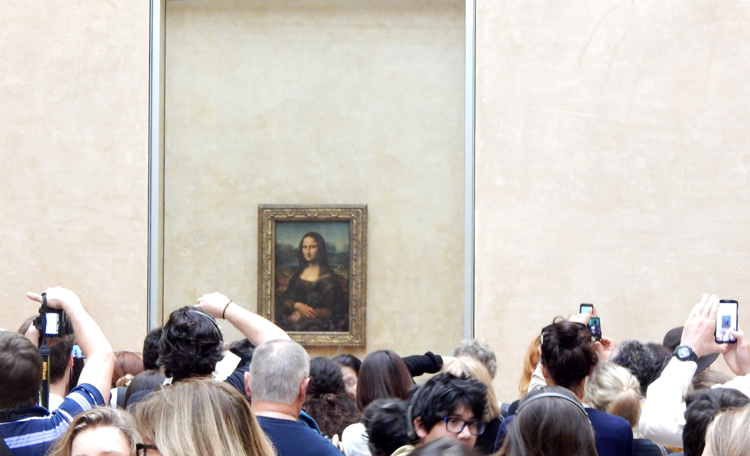 Mona Lisa and phone-camera tourists, Louvre, Paris