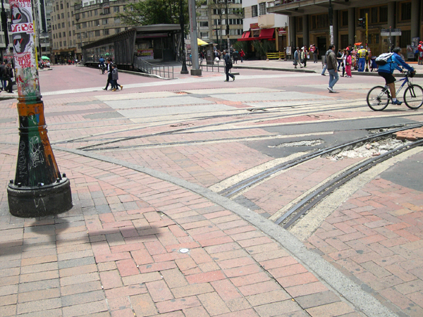 Bogota - sidewalk built over rail tracks